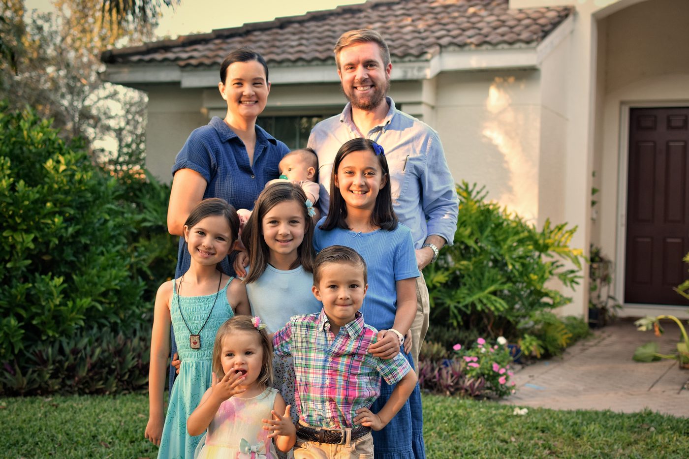 Greg Colker with his wife Jacqueline and their six children.